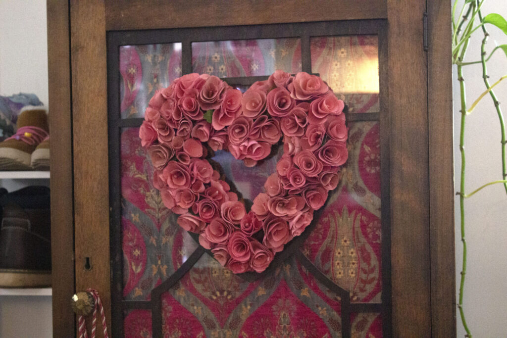 heart wreath on brown cabinet