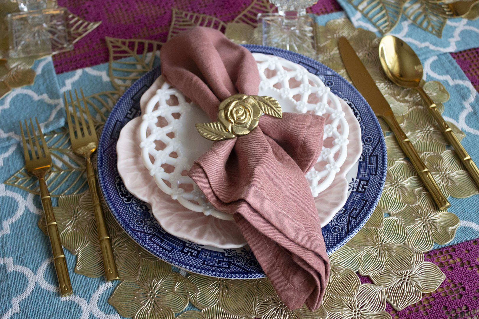 Table Setting featuring Blue Willow, Pink Cabbage Plate, and Milk Glass plate