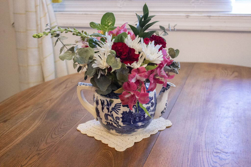 what to do with old china: teapot floral arrangement