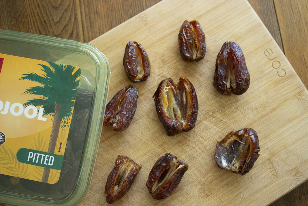 Dates sliced open with pits removed