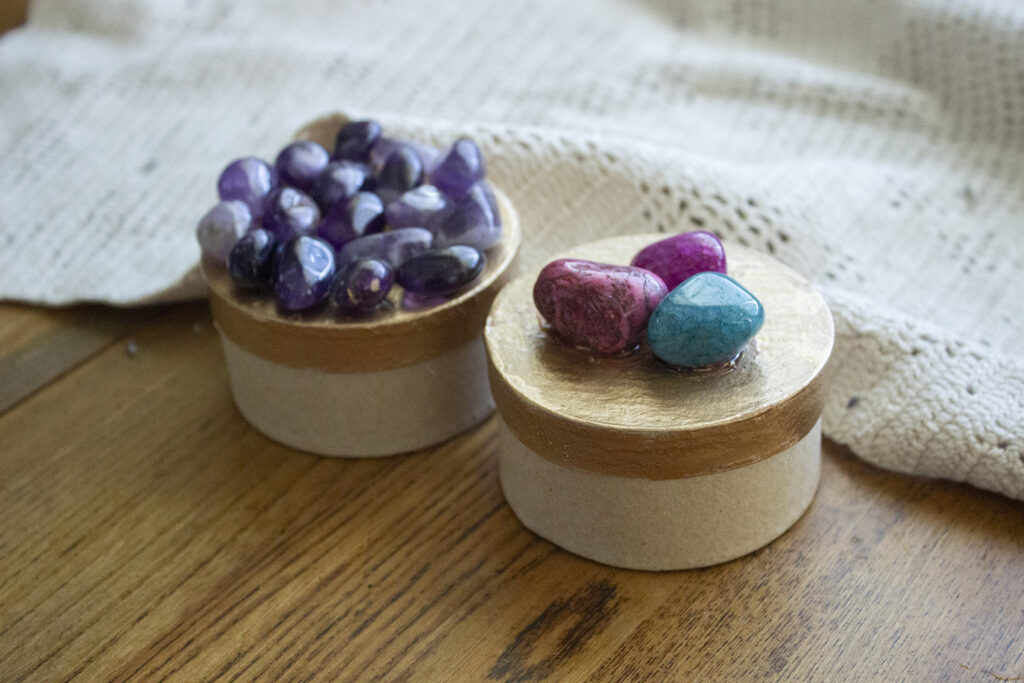 What to Do With Tumbled Rocks: Small boxes with colorful rocks on top