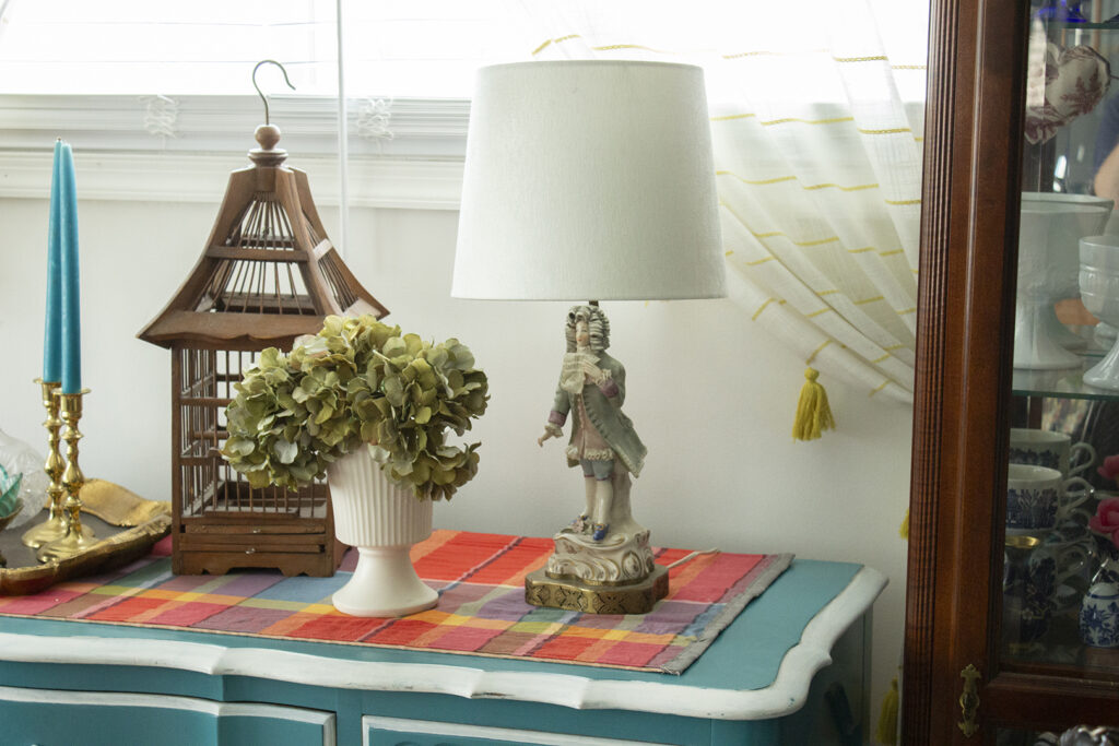 French Figurine Lamp on Blue Buffet Table