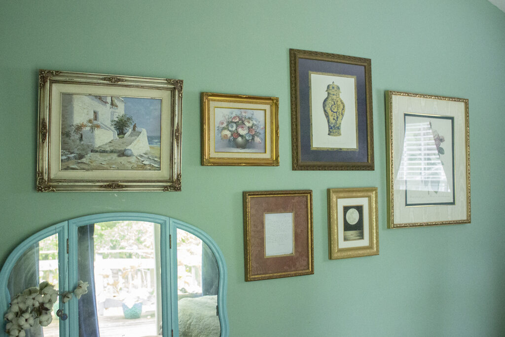 How to Make a Gallery Wall: Eclectic gallery on green wall