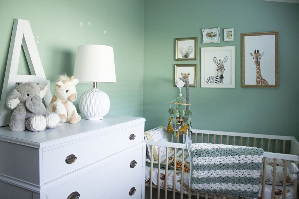 Baby nursery with jungle gallery wall