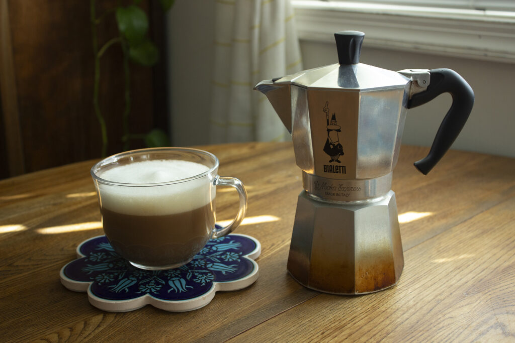How to Make a Homemade Latte: Hot Latte in Clear Mug with a Moka Pot