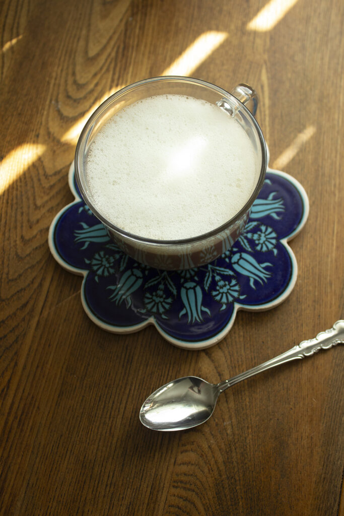 How to Make a Homemade Latte: Latte on Blue Coaster