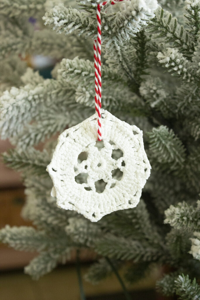 Doily DIY Snowflake Hanging From Christmas Tree