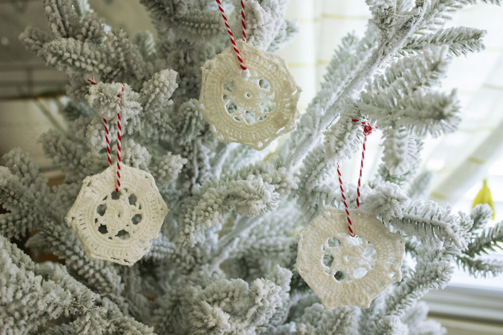 Doily DIY Snowflakes Hanging on Christmas Tree