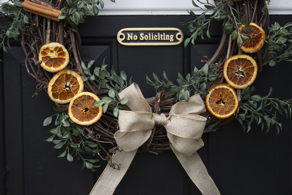 Closeup of bow attached to a grapevine wreath