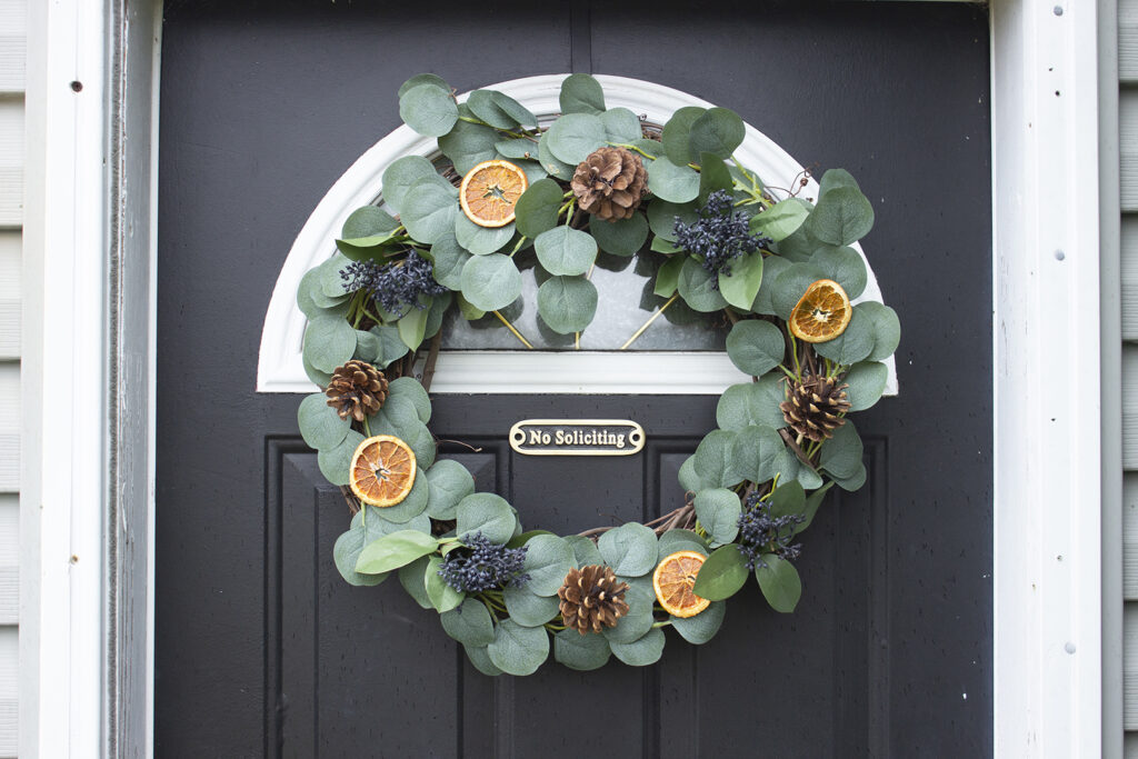 Winter Wreath Ideas: Wreath of eucalyptus, berries, and oranges