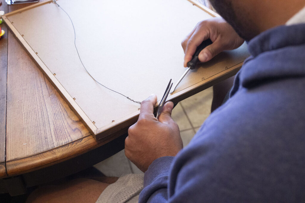 Removing staples from a wooden frame