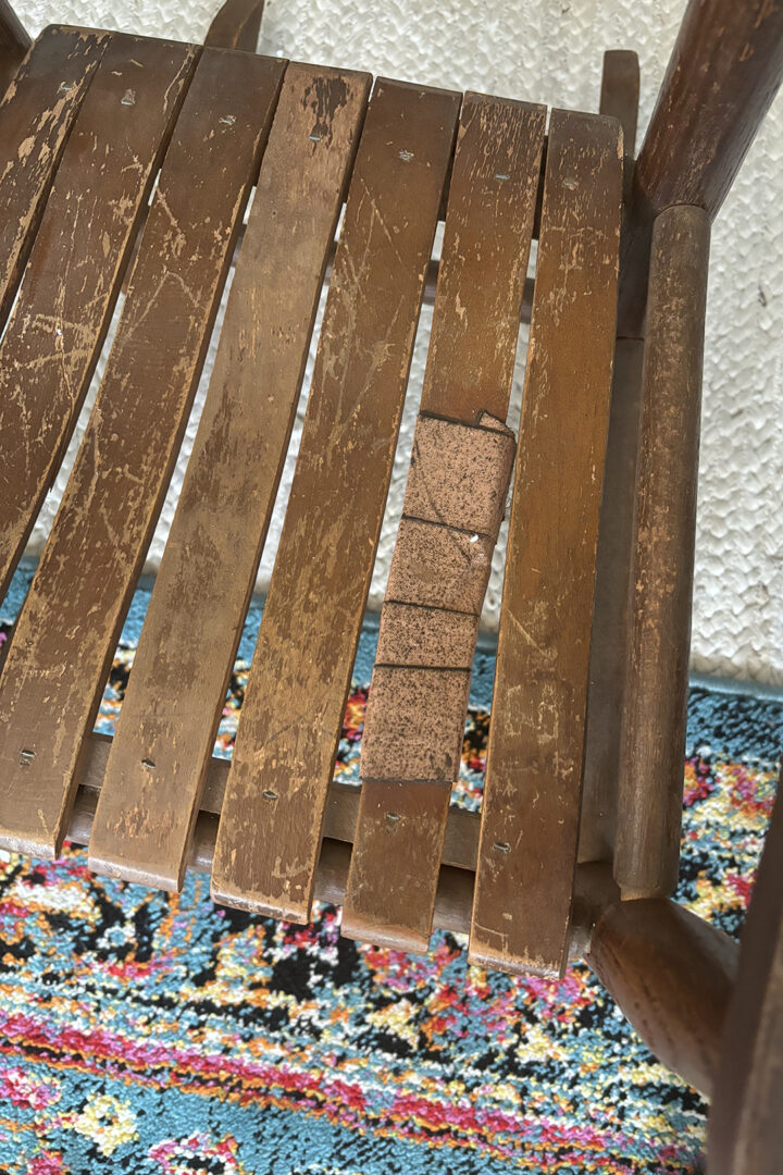 Closeup of broken rocking chair seat