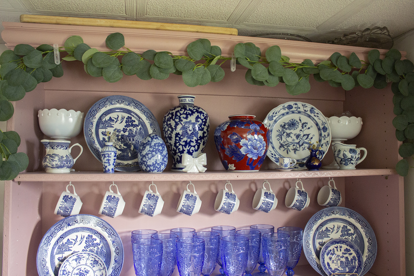 Closeup of pink hutch shelves