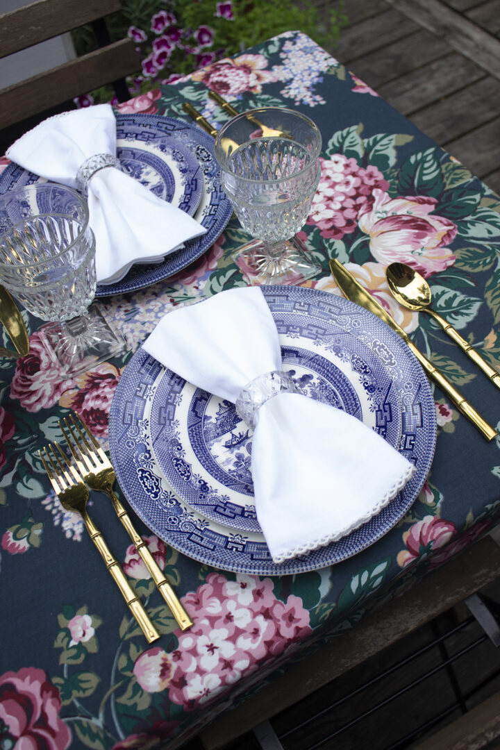Outdoor Entertaining Ideas: Closeup of Blue Willow plates in a tablescape