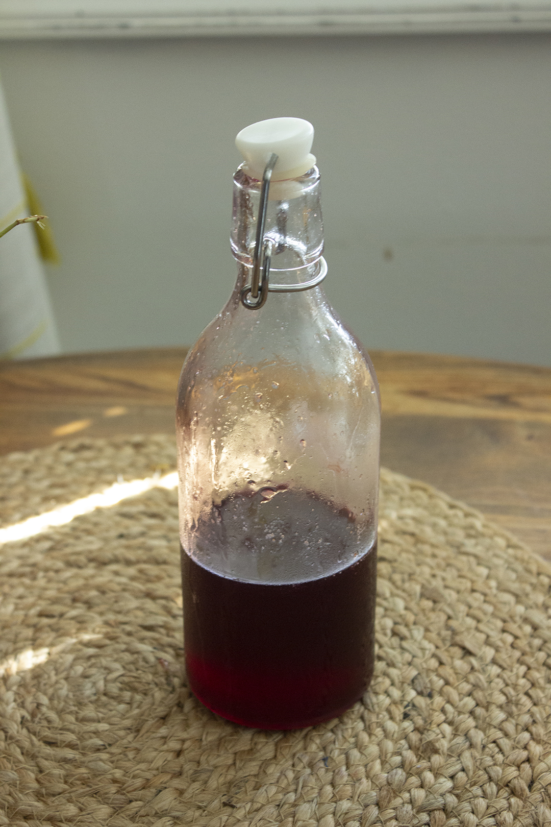 Cherry Almond Simple Syrup in glass bottle