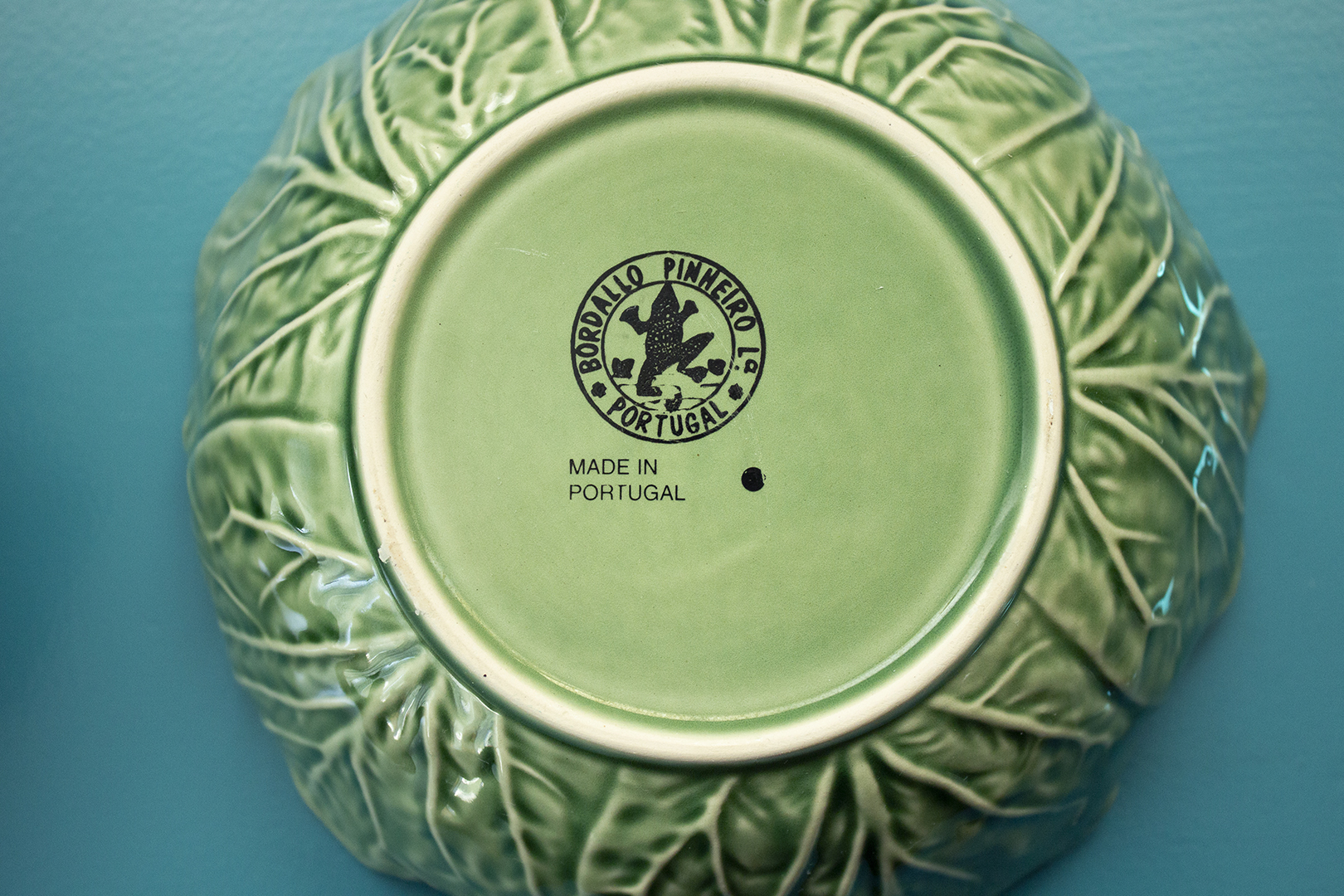 Bordallo Pinheiro makers mark on the bottom of a green cabbageware bowl